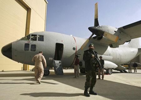 An&nbsp;Afghan&nbsp;soldier&nbsp;stands&nbsp;guard&nbsp;in&nbsp;front&nbsp;a&nbsp;C-27A&nbsp;transport&nbsp;aircraft&nbsp;which&nbsp;was&nbsp;given&nbsp;by&nbsp;the&nbsp;U.S.&nbsp;military,&nbsp;in&nbsp;Kabul&nbsp;November&nbsp;15,&nbsp;2009.&nbsp;The&nbsp;U.S.&nbsp;military&nbsp;will&nbsp;give&nbsp;Afghanistan&nbsp;20&nbsp;refurbished&nbsp;transport&nbsp;planes&nbsp;over&nbsp;the&nbsp;next&nbsp;two&nbsp;years,&nbsp;U.S.&nbsp;and&nbsp;Afghan&nbsp;officials&nbsp;said&nbsp;on&nbsp;Sunday,&nbsp;doubling&nbsp;the&nbsp;size&nbsp;of&nbsp;its&nbsp;depleted&nbsp;air&nbsp;force.(Xinhua/Reuters&nbsp;Photo)