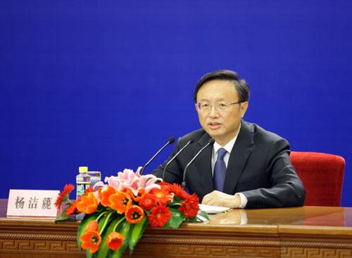 Chinese Foreign Minister Yang Jiechi answers questions during a news conference on the sidelines of the Third Session of the 11th National People's Congress (NPC) at the Great Hall of the People in Beijing, China, March 7, 2010.(Xinhua/Xing Guangli)