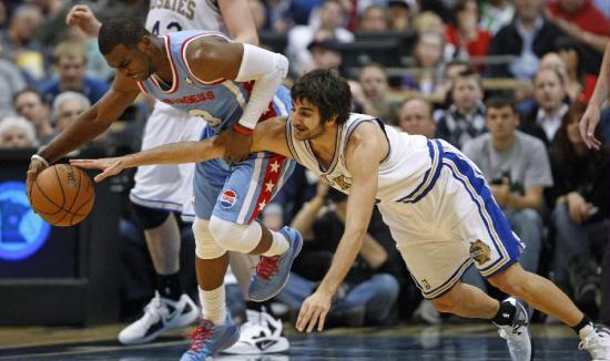 Minnesota Timberwolves guard Ricky Rubio (9) tries to steal the ball from Los Angeles Clippers guard Chris Paul (L) during the second half of their NBA basketball game in the Target Center in Minneapolis, March 5, 2012. Minnesota and Los Angeles are wearing throwback uniforms. Timberwolves beat Clippers 95-94. (Xinhua/Reuters Photo)