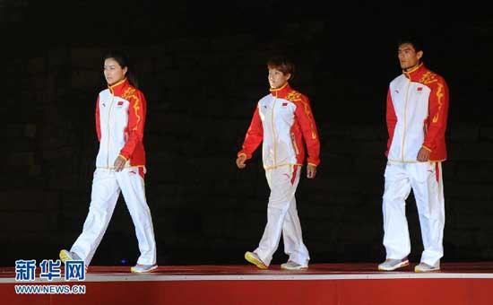 Chinese athletes present the official Champion's Podium-wear for the Chinese national team at London Olympic Games.