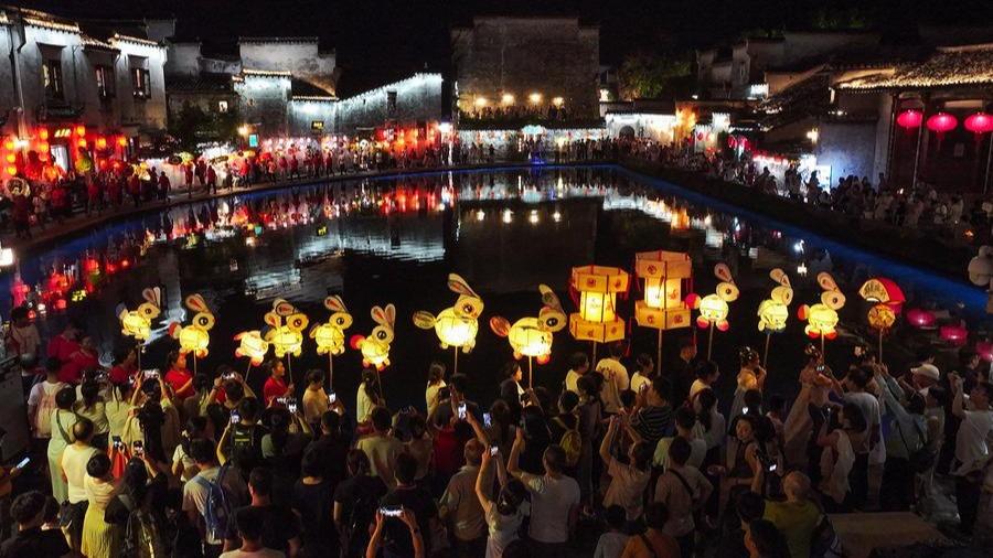 Mid-Autumn lanterns illuminate ancient village in E China's Anhui