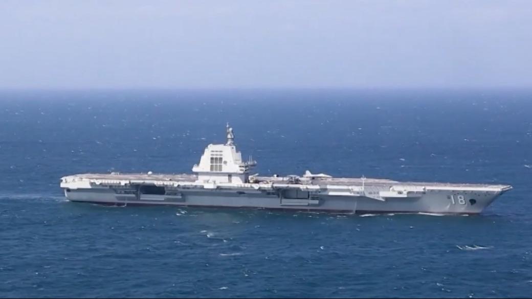 Aircraft carrier Fujian formation conducts first live-force training at sea