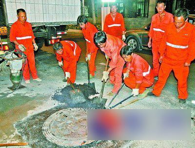 全市雨水窨井盖将挂 身份牌 无主井盖也将有人