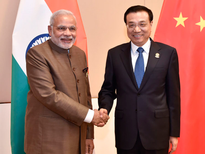 李克强首次会晤印度总理莫迪 邀其明年访华_央