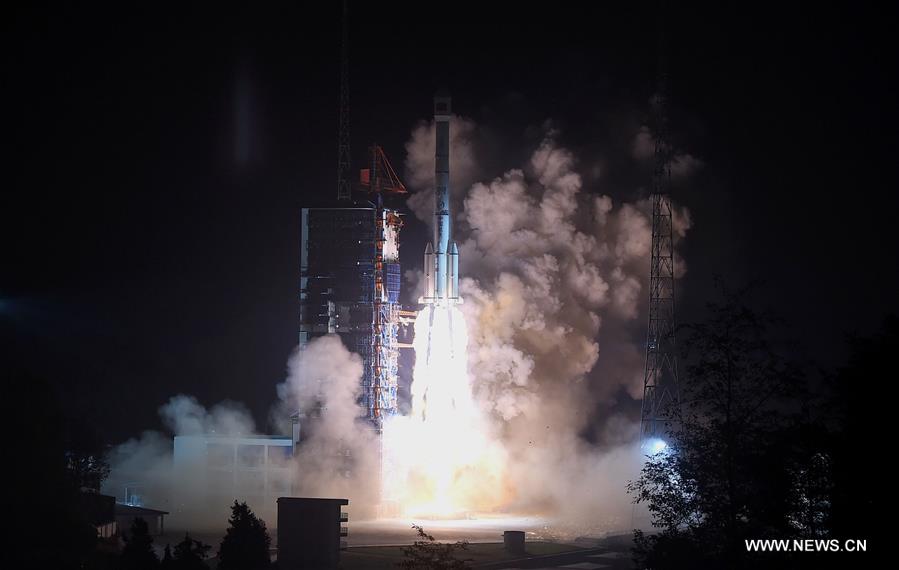 A Long March-3C rocket carrying the ChinaSat 1C satellite blasts off at the Xichang Satellite Launch Center in southwest China