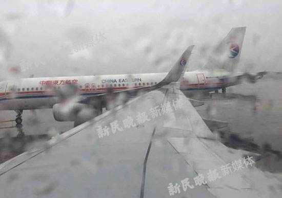 上海虹桥机场两东航航班机翼发生碰擦_新闻_