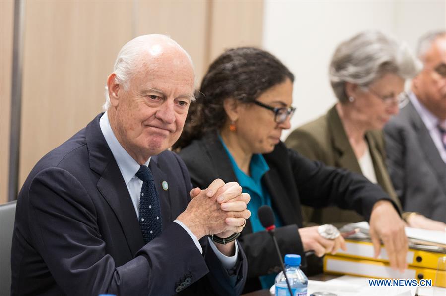 GENEVA, April 18, 2016 (Xinhua ) -- UN Special Envoy for Syria Staffan de Mister (1st L) attends a meeting with the High Negotiations Committee (HNC) delegation at Palais des Nations in Geneva, Switzerland, April 18, 2016. New round of the Intra-Syria talks entered into second week with UN special envoy Staffan de Mister holding separate discussions with government delegation and HNC delegation Monday. (Xinhua/POOL/Xu Jinquan)