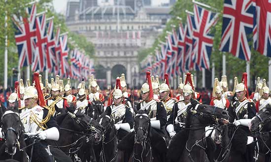 Guardsmen arrive back at Buckingham Palace from Horseguards Parade after the annual Trooping the Colour ceremony in central London, Britain June 11, 2016. Trooping the Colour is a ceremony to honour Queen Elizabeth