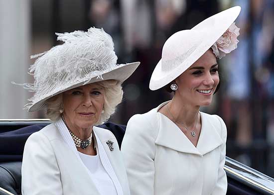 Camilla Duchess of Cornwall (L) and Catherine Duchess of Cambridge travel in a carriage to Horseguards Parade for the annual Trooping the Colour ceremony in central London, Britain June 11, 2016. Trooping the Colour is a ceremony to honour Queen Elizabeth