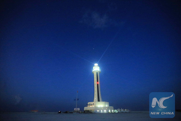 Photo taken on April 5, 2016 shows the lighthouse on Zhubi Reef of Nansha Islands in the South China Sea, south China. [Photo: Xinhua/Xing Guangli]