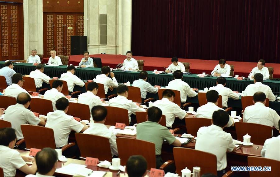  Chinese President Xi Jinping presides over a symposium on poverty alleviation in Yinchuan, northwest China
