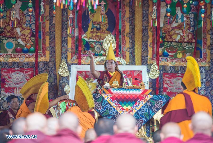 The 11th Panchen Lama Bainqen Erdini Qoigyijabu delivers a sermon during the Kalachakra ritual in Xigaze, southwest China