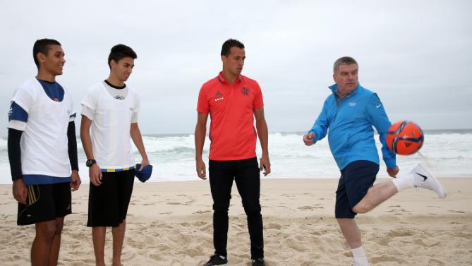 Thomas Bach plays beach football ahead of Games