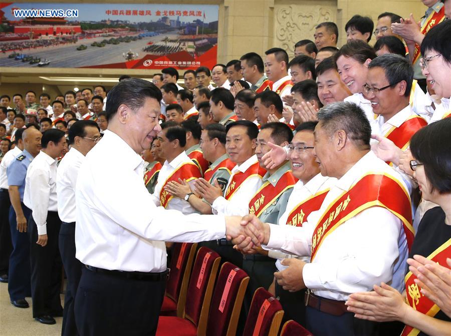 BEIJING, July 29, 2016 (Xinhua) -- Chinese President Xi Jinping (L, front) and Premier Li Keqiang meet with representatives from model organizations and individuals who are here to receive awards for promoting military-civilian solidarity in Beijing, capital of China, July 29, 2016. (Xinhua/Ju Peng) 