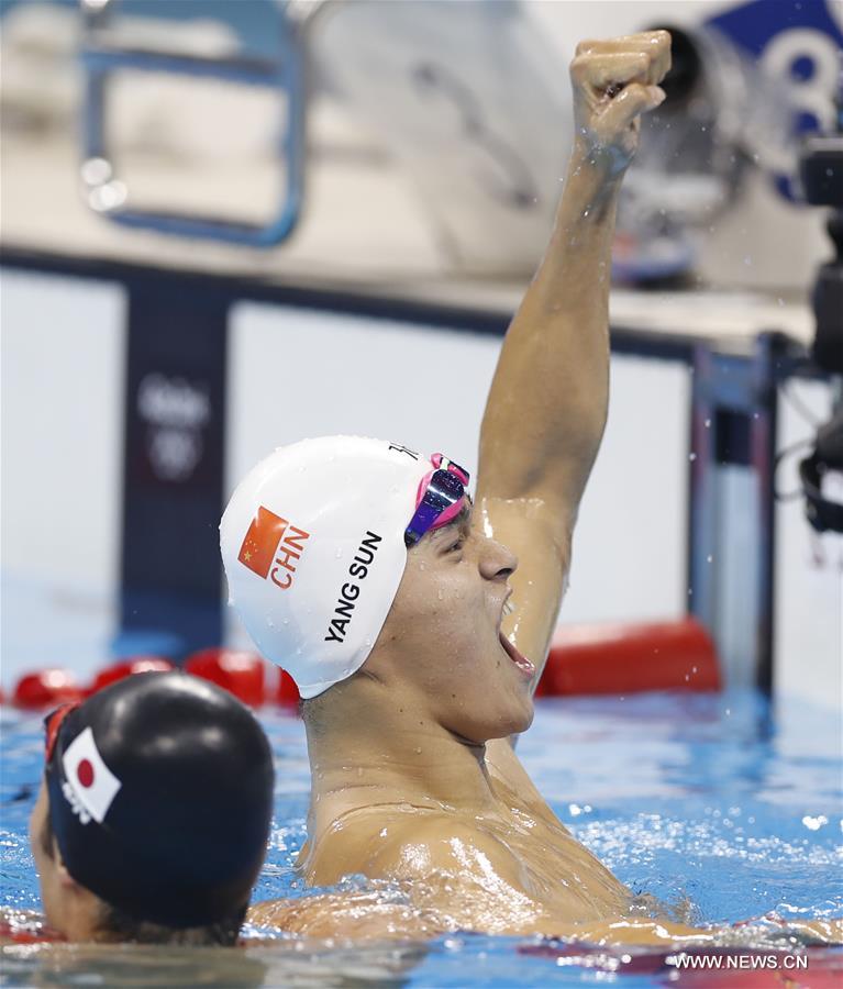 Sun Yang of China jubilates after the men