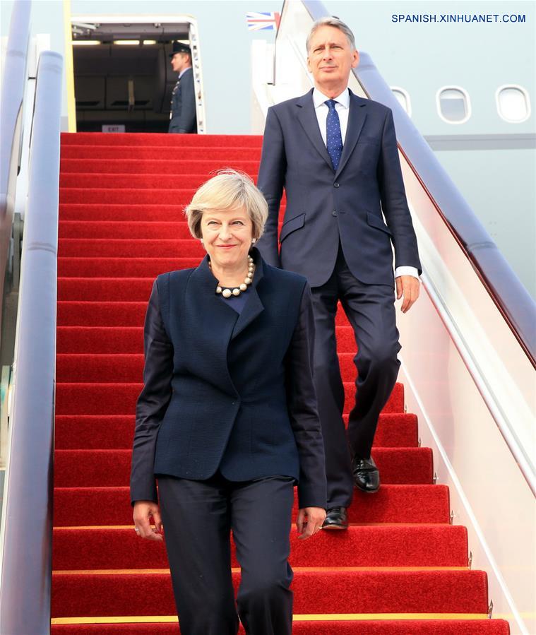 La primera ministra brit&aacute;nica, Theresa May, llega para asistir a la 11 Cumbre del Grupo de los Veinte (G20), en Hangzhou, en el este de China, el 4 de septiembre de 2016. (Xinhua/Li Mingfang)
