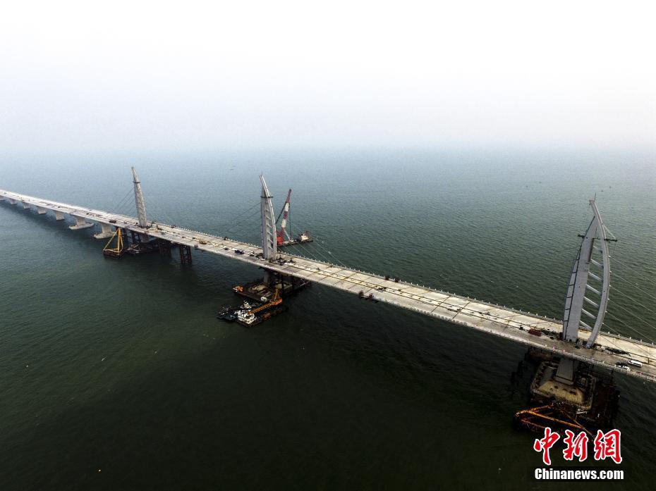 The 55-kilometer Hong Kong-Zhuhai-Macao Bridge is scheduled to be connected today, making it the world
