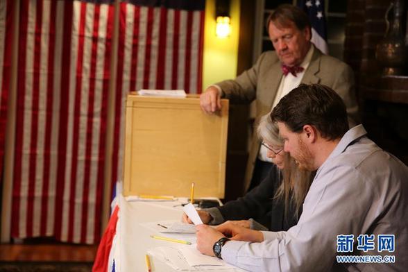 US Election Day got off to its usual early start in a village in New Hampshire at midnight Tuesday.