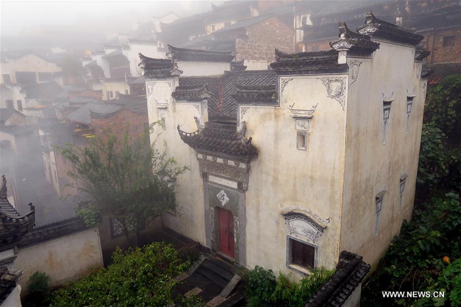 Photo taken on Nov. 13, 2016 shows the Hui-style architecture in Wuyuan County, east China