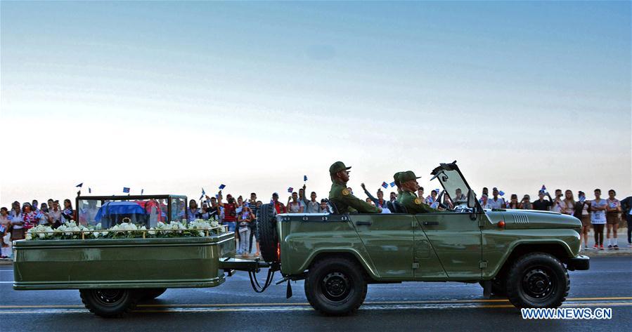 The caravan carrying the urn that holds the ashes of Cuban revolutionary leader Fidel Castro is greeted by people at Malecon Habanero Avenue in Havana, capital of Cuba, on Nov. 30, 2016. On Wednesday, Fidel Castro