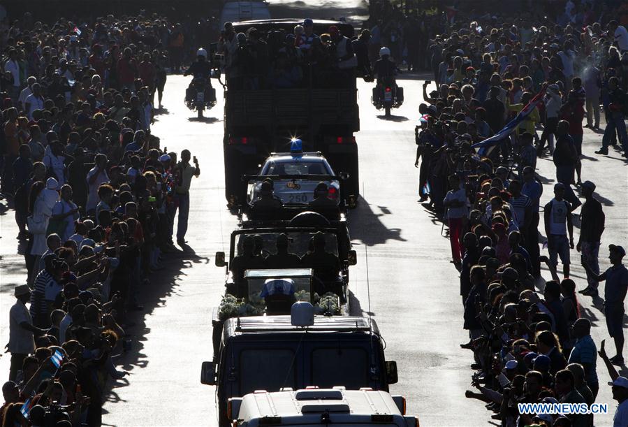 People line the street to bid farewell to the caravan carrying the ashes of Cuban revolutionary leader Fidel Castro on the outskirts of Havana, capital of Cuba, on Nov. 30, 2016. On Wednesday, Fidel Castro