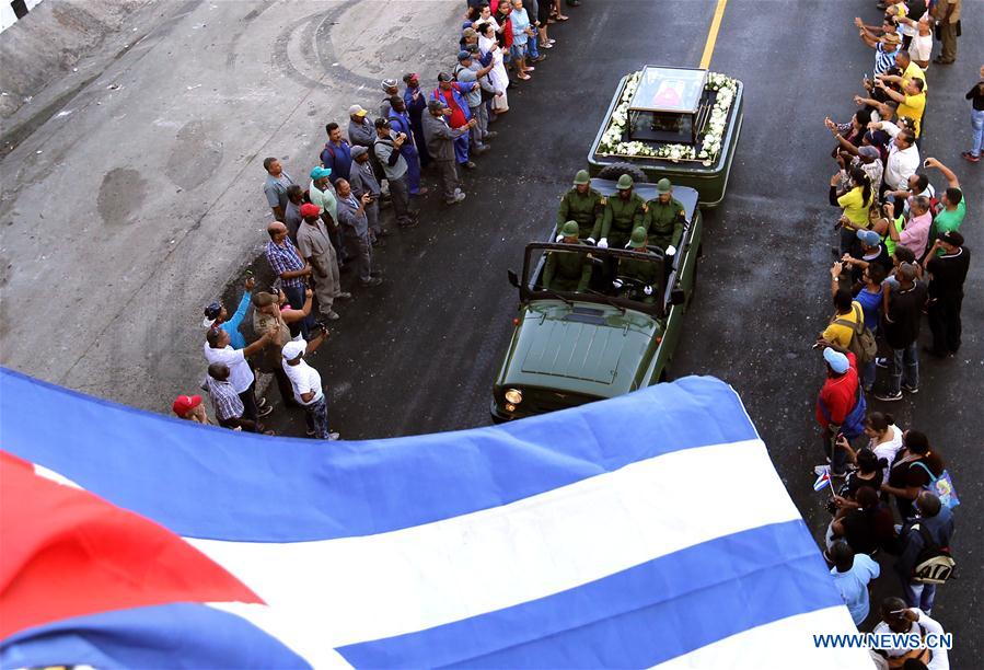 People line the street to bid farewell to the caravan carrying the ashes of Cuban revolutionary leader Fidel Castro on outskirts of Havana, capital of Cuba, on Nov. 30, 2016. On Wednesday, Fidel Castro
