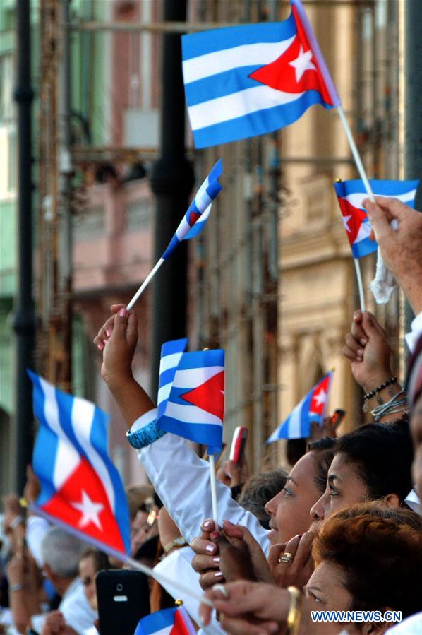 People gather to greet the motorcade that escorts the ashes of Cuban revolutionary leader Fidel Castro, at Malecon Habanero Avenue in Havana, capital of Cuba, on Nov. 30, 2016. On Wednesday, Fidel Castro