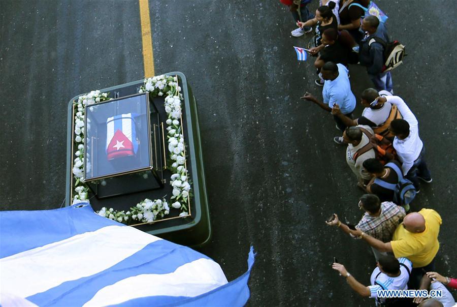 People line the street to bid farewell to the caravan carrying the ashes of Cuban revolutionary leader Fidel Castro on the outskirts of Havana, capital of Cuba, on Nov. 30, 2016. On Wednesday, Fidel Castro