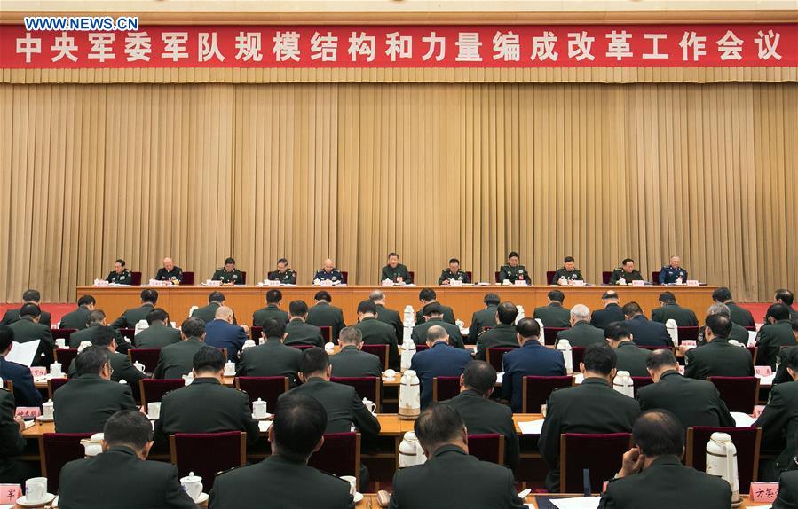 Chinese President Xi Jinping (C, rear), also general secretary of the Communist Party of China (CPC) Central Committee and chairman of the Central Military Commission (CMC), attends a two-day conference on reforms of the military