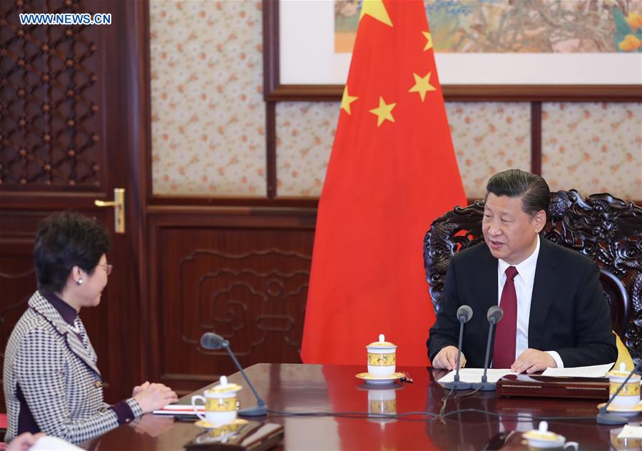 Chinese President Xi Jinping (R) meets with Lam Cheng Yuet-ngor, the newly appointed chief executive of the Hong Kong Special Administrative Region (HKSAR), in Beijing, capital of China, April 11, 2017. (Xinhua/Ju Peng)