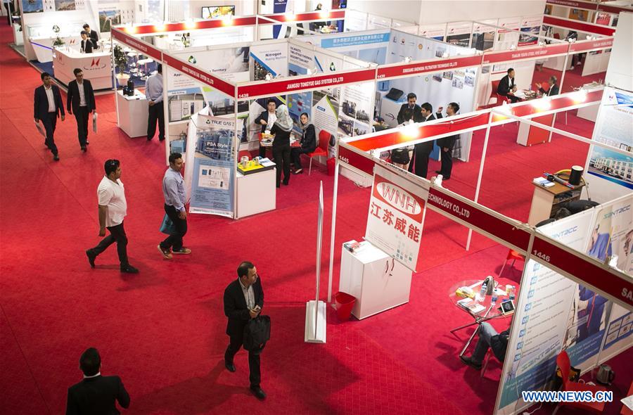 People visit Chinese companies booths at the 22nd Iran International Oil, Gas, Refining and Petrochemical Exhibition in Tehran, Iran, May 6, 2017. Iran kicked off a major energy exhibition in the capital Tehran on Saturday with the participation of 1,500 foreign companies. (Xinhua/Ahmad Halabisaz)