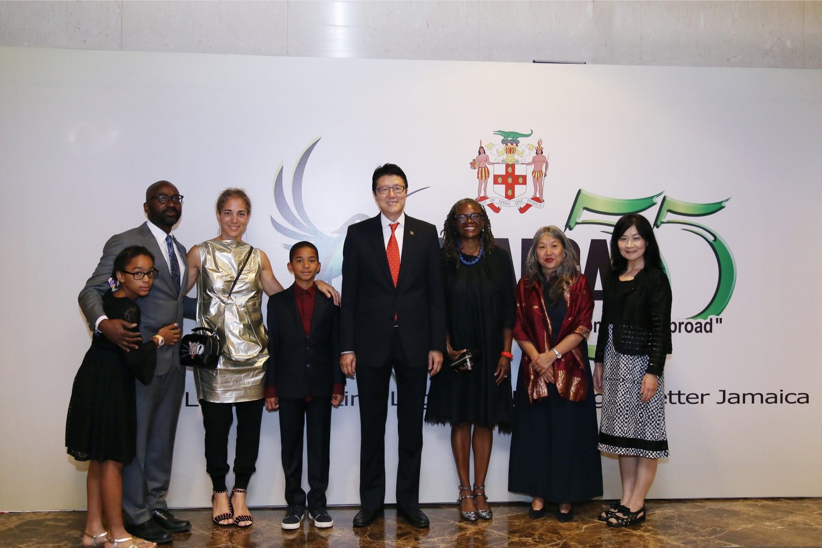 His Excellency, Antonia Hugh, Jamaican Ambassador to the P.R.C.  (4th right) shares lens time with Professor Deborah Thomas  (3rd left) film producer Jeanette Kong (2nd right) and other distinguished guests during the 55th Anniversary celebration of Jamaica