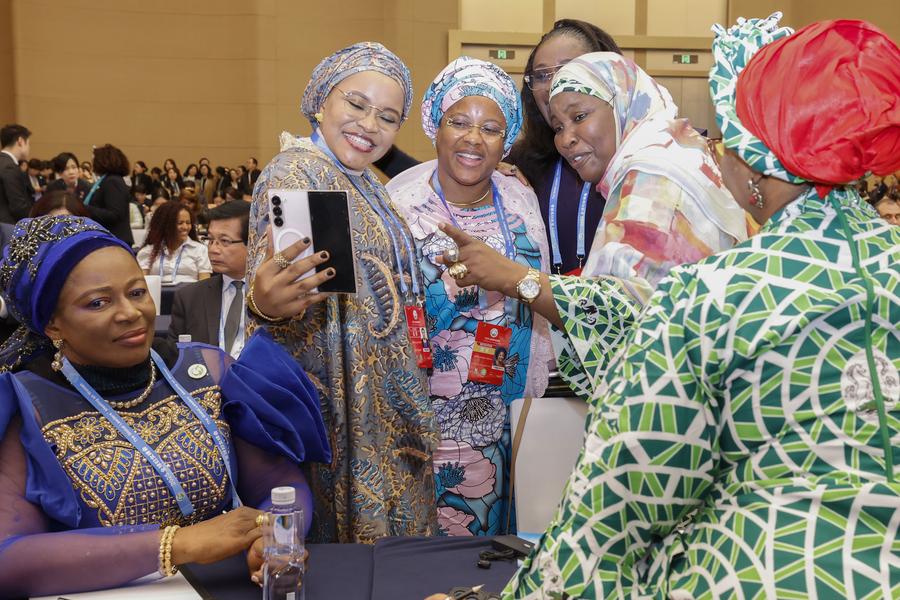 Participants make a video call while attending the Global Leaders