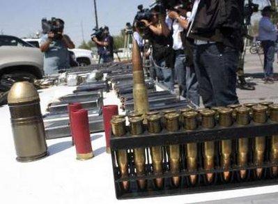 Mexican&nbsp;media&nbsp;film&nbsp;ammunition&nbsp;seized&nbsp;during&nbsp;the&nbsp;arrest&nbsp;of&nbsp;Alberto&nbsp;Mendoza&nbsp;Contreras&nbsp;alias&nbsp;"The&nbsp;bad&nbsp;kid",&nbsp;a&nbsp;suspected&nbsp;leader&nbsp;of&nbsp;the&nbsp;Beltran&nbsp;Leyva&nbsp;cartel,&nbsp;in&nbsp;Monterrey&nbsp;March&nbsp;19,&nbsp;2010.&nbsp;Drug&nbsp;violence&nbsp;has&nbsp;exploded&nbsp;across&nbsp;Mexico&nbsp;since&nbsp;President&nbsp;Felipe&nbsp;Calderon&nbsp;came&nbsp;to&nbsp;power&nbsp;in&nbsp;late&nbsp;2006&nbsp;and&nbsp;set&nbsp;the&nbsp;army&nbsp;on&nbsp;smuggling&nbsp;gangs.&nbsp;Turf&nbsp;wars&nbsp;between&nbsp;rival&nbsp;cartels&nbsp;and&nbsp;security&nbsp;forces&nbsp;have&nbsp;killed&nbsp;nearly&nbsp;19,000&nbsp;people&nbsp;in&nbsp;three&nbsp;years,&nbsp;with&nbsp;the&nbsp;worst&nbsp;of&nbsp;the&nbsp;bloodshed&nbsp;seen&nbsp;in&nbsp;northern&nbsp;border&nbsp;cities.&nbsp;REUTERS/Kristian&nbsp;Lopez