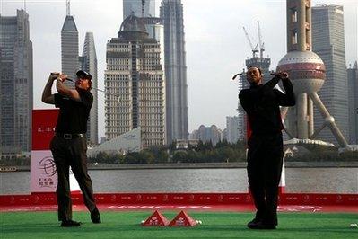 Phil&nbsp;Mickelson&nbsp;of&nbsp;the&nbsp;U.S.,&nbsp;left,&nbsp;and&nbsp;his&nbsp;compatriot&nbsp;Tiger&nbsp;Woods&nbsp;hit&nbsp;the&nbsp;balls&nbsp;during&nbsp;a&nbsp;photo&nbsp;call&nbsp;of&nbsp;the&nbsp;HSBC&nbsp;Champions&nbsp;golf&nbsp;tournament&nbsp;Tuesday,&nbsp;Nov.&nbsp;3,&nbsp;2009&nbsp;in&nbsp;Shanghai,&nbsp;China.&nbsp;The&nbsp;golf&nbsp;tournament&nbsp;will&nbsp;be&nbsp;held&nbsp;at&nbsp;Shanghai&nbsp;Sheshan&nbsp;International&nbsp;Golf&nbsp;Club&nbsp;from&nbsp;Nov.&nbsp;5&nbsp;to&nbsp;8.&nbsp;(AP&nbsp;Photo/Eugene&nbsp;Hoshiko)&nbsp;