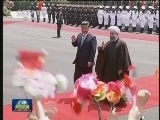 习近平举行仪式欢迎伊朗总统访华