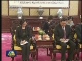 习近平会见崔世安