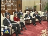 张德江会见法国总理