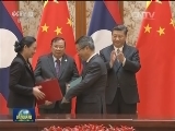 习近平同老挝人民革命党中央总书记 国家主席举行会谈