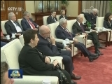 张德江会见法国总统
