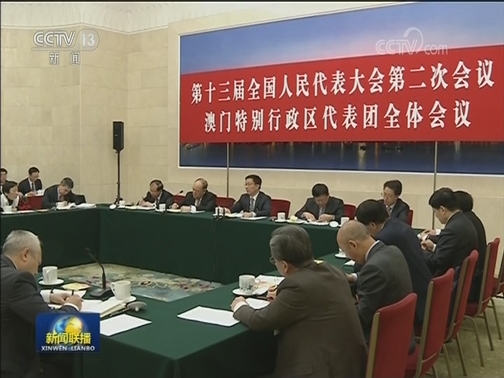 韩正分别参加全国人大香港代表团 澳门代表团审议