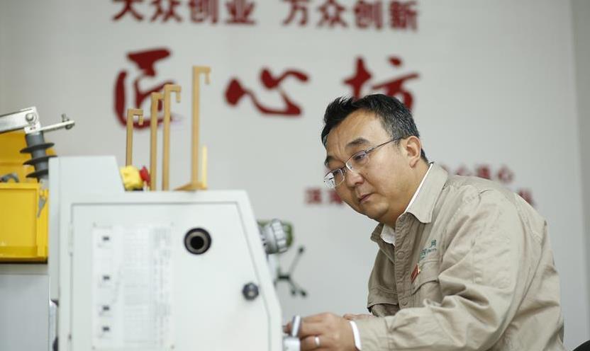 时代楷模张黎明先进事迹报告会