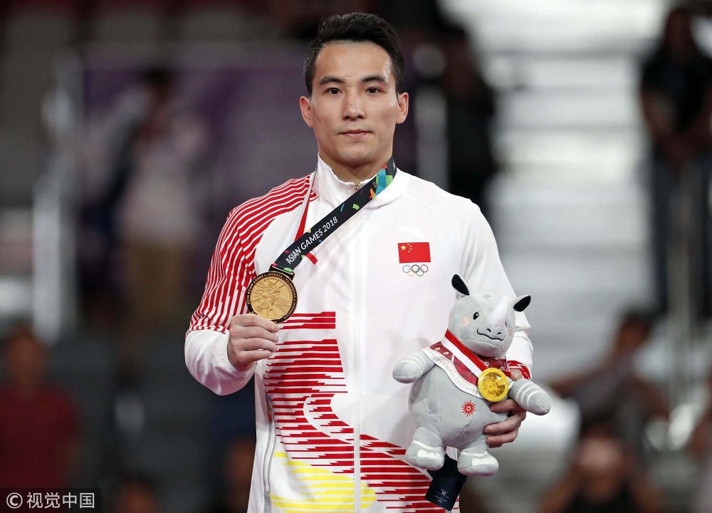 [高清组图]男子吊环邓书弟问鼎 中国队五连冠