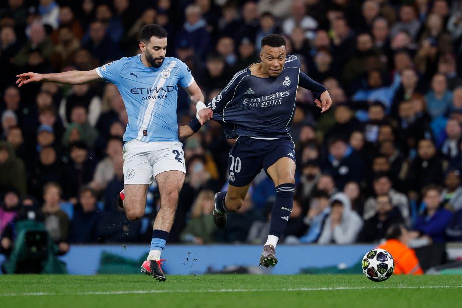 维尼修斯双响B席送点 皇马总分5-1曼城进八强