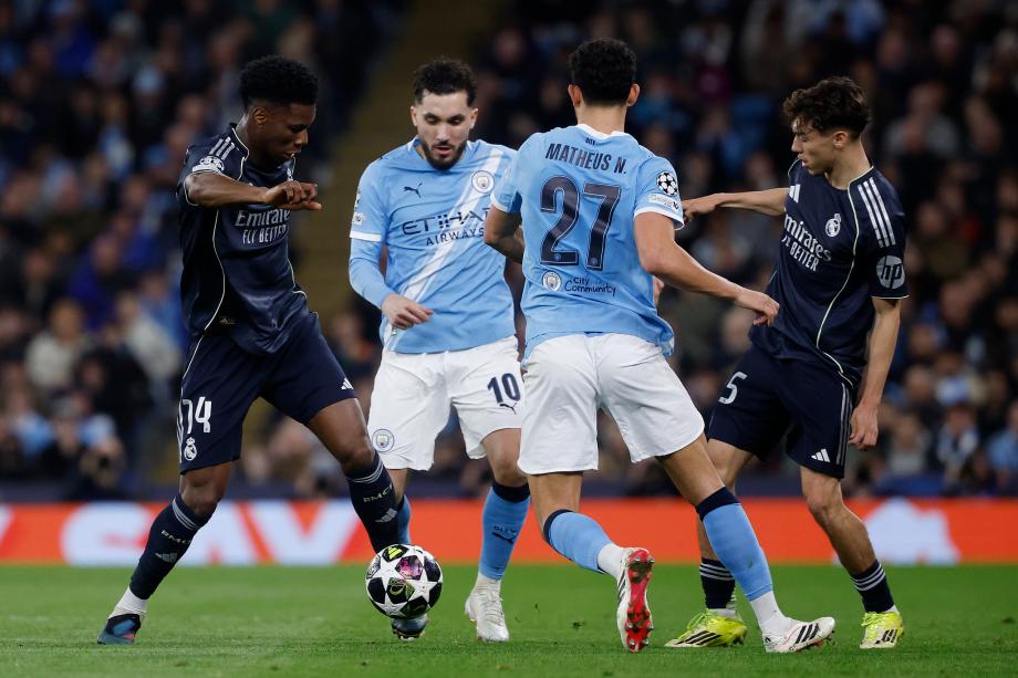 维尼修斯双响B席送点 皇马总分5-1曼城进八强