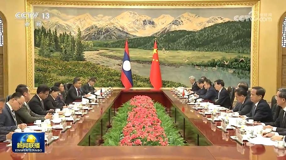 王沪宁会见老挝建国阵线中央委员会主席