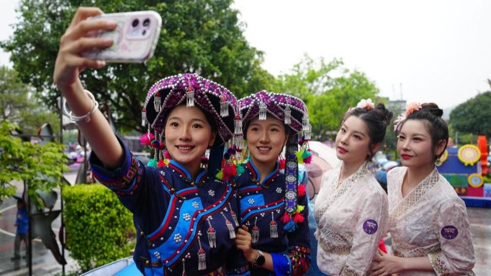 Twin festival lures tourists in SW China's Yunnan