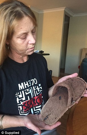 澳女子称找到mh370遇难者遗物 包括疑似女乘客所穿拖鞋