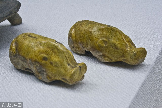 黄釉猪,唐代.1974年山东省军区五所出土,济南市博物馆藏.