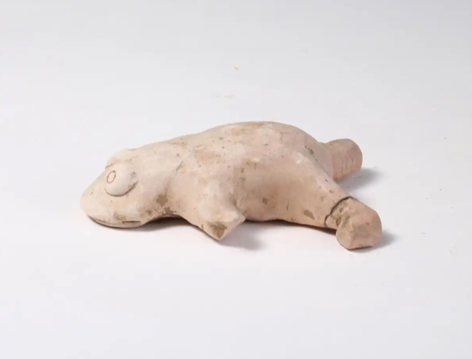 整个身子屈肢俯卧